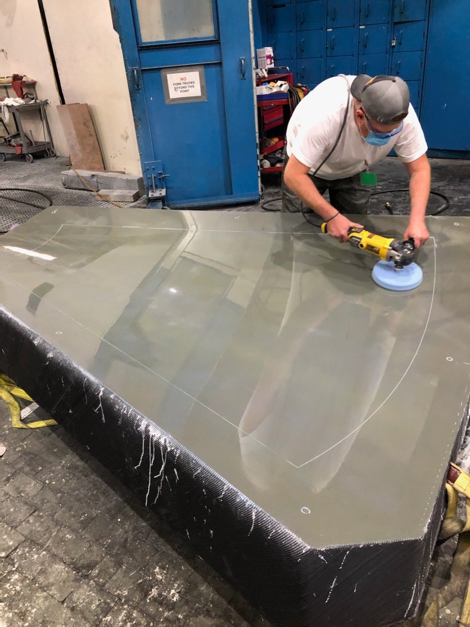 Tru-Design technician polishing a tooling surface